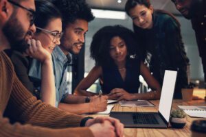 Diverse team of web content writers working on a client site.