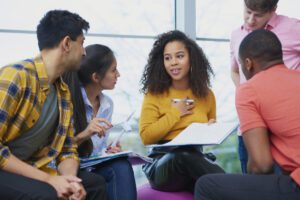 a young, diverse web content writing team working together